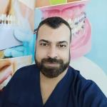دكتور اسامه ابراهيم استشاري جراحة الفم والأسنان والتقويم في فيصل