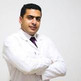 دكتور محمد على اخصائي تقويم وزراعة الاسنان - قصر العيني في الوراق