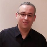 دكتور احمد عبد الحق أخصائي حقن مجهري واطفال انابيب في ميدان الجيزة