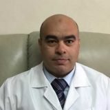 دكتور احمد ممدوح رئيس قسم الامراض الصدريه والباطنه بمستشفيات هيئه الشرطه في المهندسين