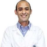 دكتور حسين النوري طبيب و جراح الفم و الأسنان و أطفال الأسنان في الدقي