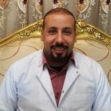 دكتور محمد حلمى أخصائي نساء وتوليد في فيصل