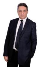 دكتور حازم حسن الزيات مدرس وإستشاري جراحة المخ والأعصاب والعمود الفقري بالقصر العيني في المهندسين