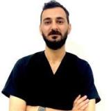 دكتور عمرو محيسن الشريف-مركز سمايل بلانيت طبيب امراض اسنان في مصر الجديدة