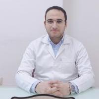 اخصائي زراعة الاسنان و جراحات الوجه و الفكين