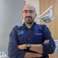 اخصائي التجميل وجراحة الفم والأسنان